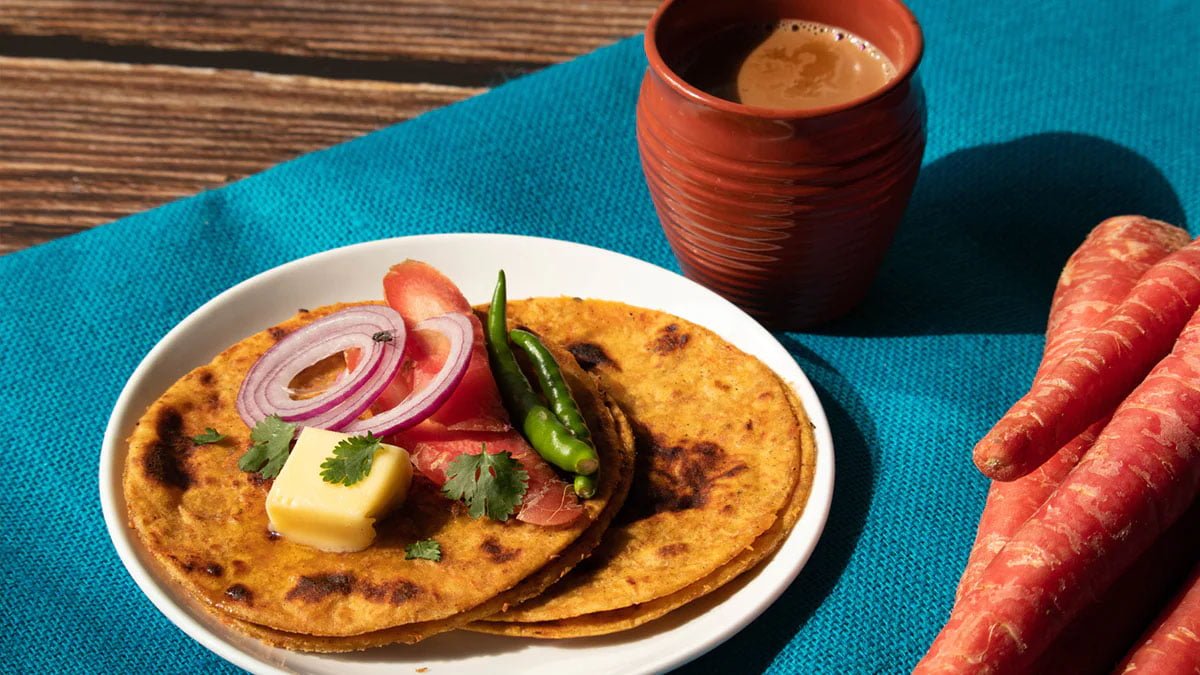 Gajar ka Paratha: सुबह के नाश्‍ते में बनाएं सेहत से भरपूर टेस्‍टी गाजर का पराठा, स्‍वाद लेते ही चट कर जाएंगे
